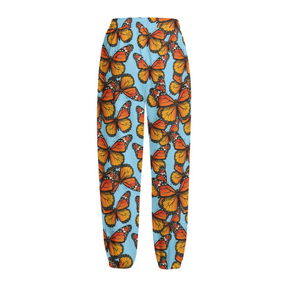 Orange Monarch Butterflies Pattern Print Fleece Lined Knit Pants