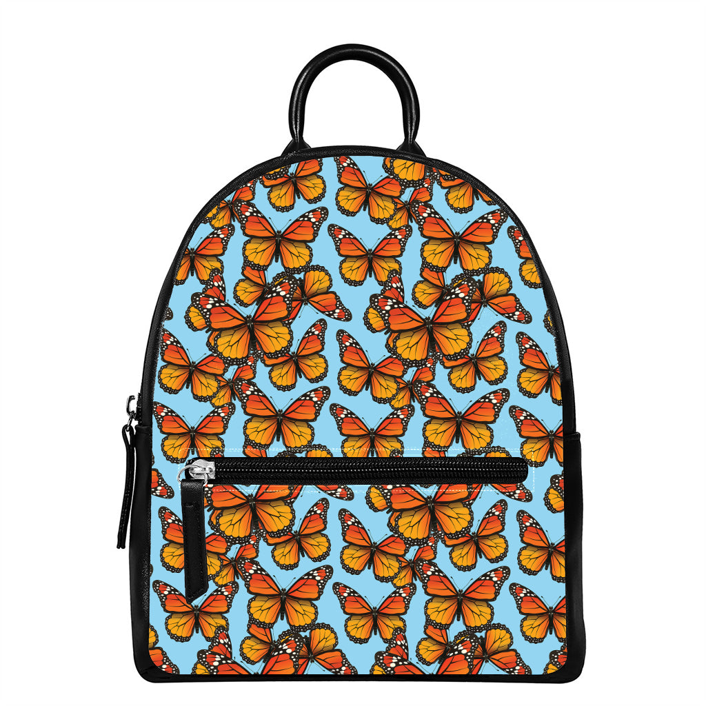 Orange Monarch Butterflies Pattern Print Leather Backpack