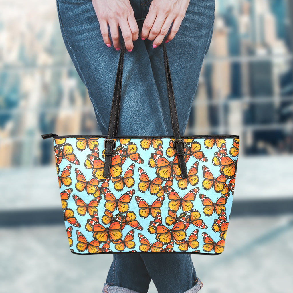 Orange Monarch Butterflies Pattern Print Leather Tote Bag