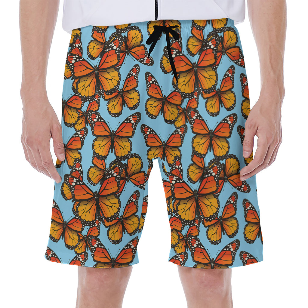 Orange Monarch Butterflies Pattern Print Men's Beach Shorts