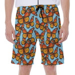 Orange Monarch Butterflies Pattern Print Men's Beach Shorts