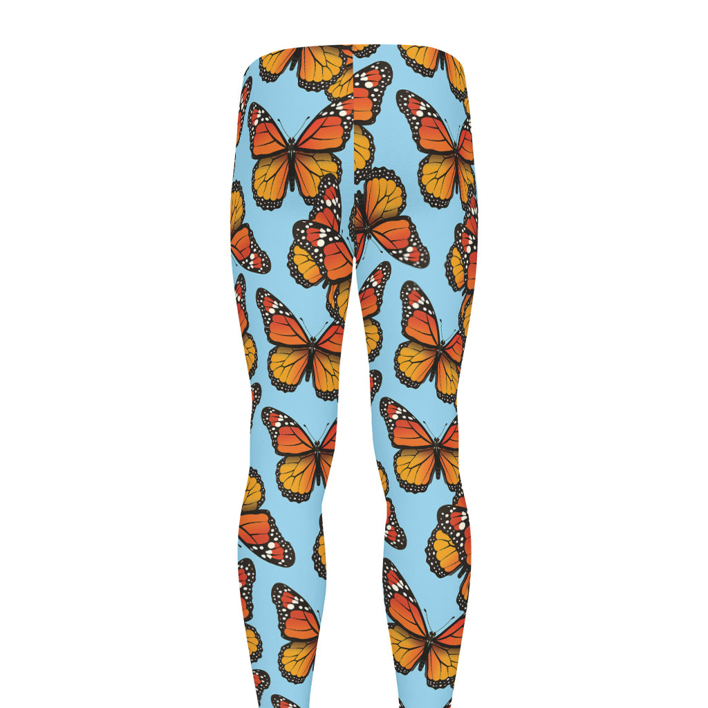 Orange Monarch Butterflies Pattern Print Men's leggings