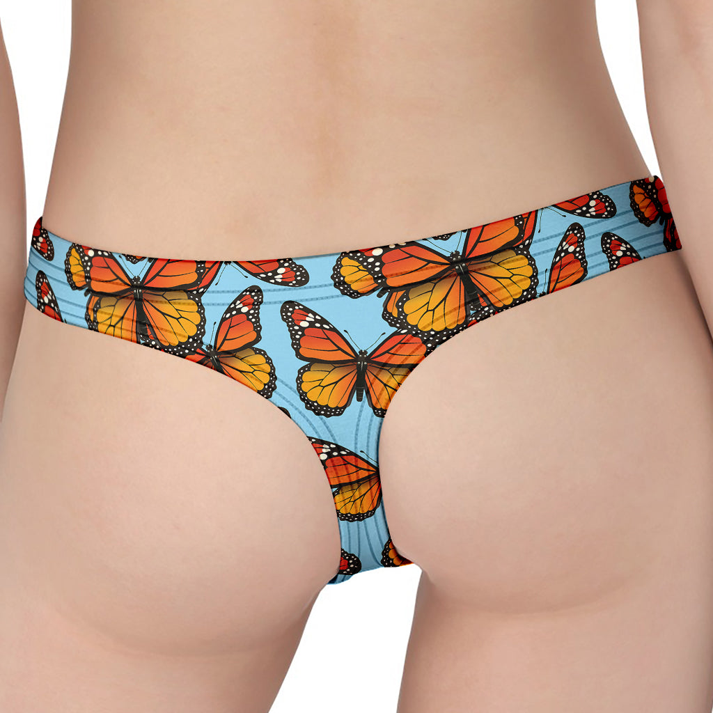 Orange Monarch Butterflies Pattern Print Women's Thong
