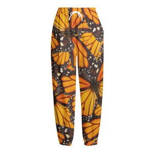 Orange Monarch Butterfly Pattern Print Fleece Lined Knit Pants