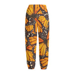 Orange Monarch Butterfly Pattern Print Fleece Lined Knit Pants