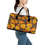 Orange Monarch Butterfly Pattern Print Leather Duffle Bag