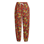 Orange Monarch Butterfly Print Fleece Lined Knit Pants