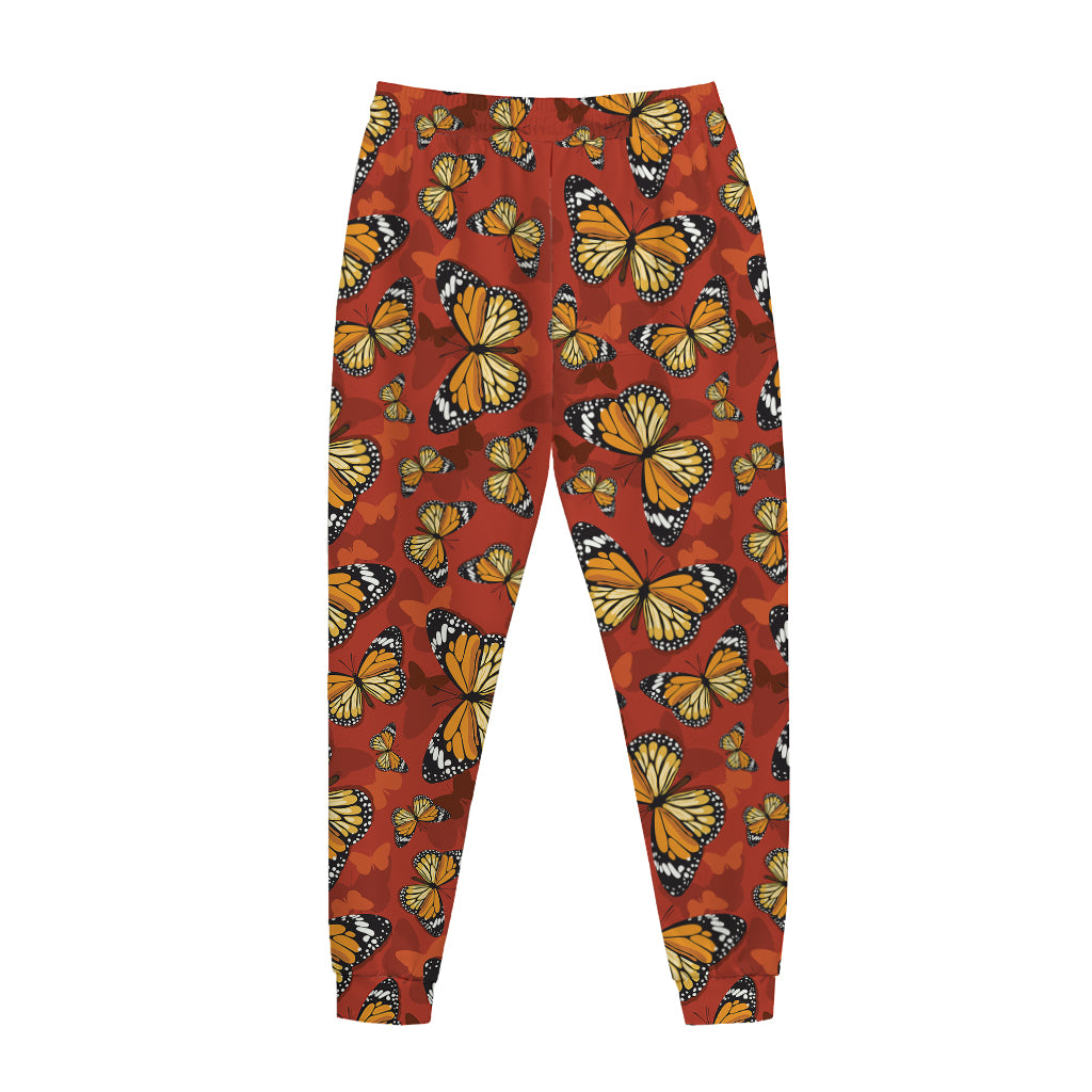 Orange Monarch Butterfly Print Jogger Pants