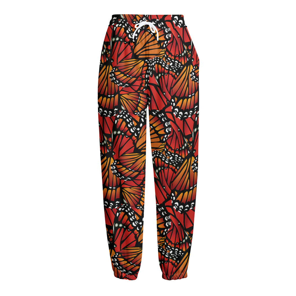 Orange Monarch Butterfly Wings Print Fleece Lined Knit Pants