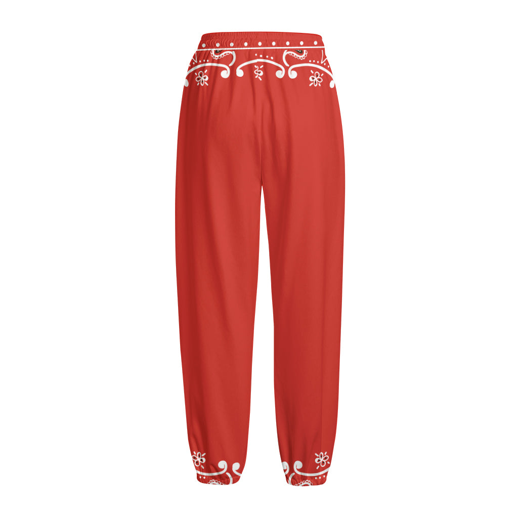 Orange Paisley Bandana Print Fleece Lined Knit Pants