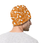 Orange Paw And Bone Pattern Print Beanie