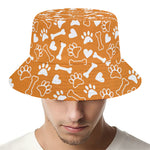 Orange Paw And Bone Pattern Print Bucket Hat