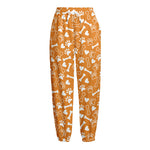 Orange Paw And Bone Pattern Print Fleece Lined Knit Pants