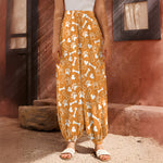 Orange Paw And Bone Pattern Print Harem Pants