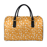Orange Paw And Bone Pattern Print Leather Duffle Bag