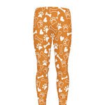 Orange Paw And Bone Pattern Print Men's leggings