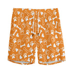 Orange Paw And Bone Pattern Print Men's Sports Shorts