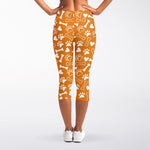 Orange Paw And Bone Pattern Print Women's Capri Leggings
