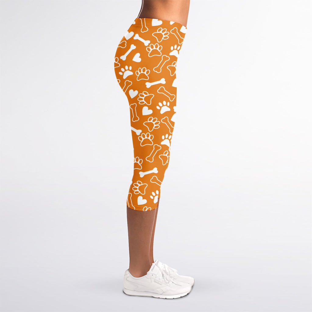 Orange Paw And Bone Pattern Print Women's Capri Leggings