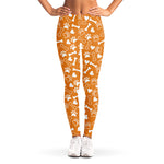 Orange Paw And Bone Pattern Print Women's Leggings