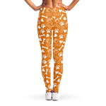 Orange Paw And Bone Pattern Print Women's Leggings