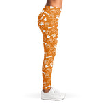 Orange Paw And Bone Pattern Print Women's Leggings