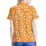 Orange Paw And Bone Pattern Print Women's Polo Shirt