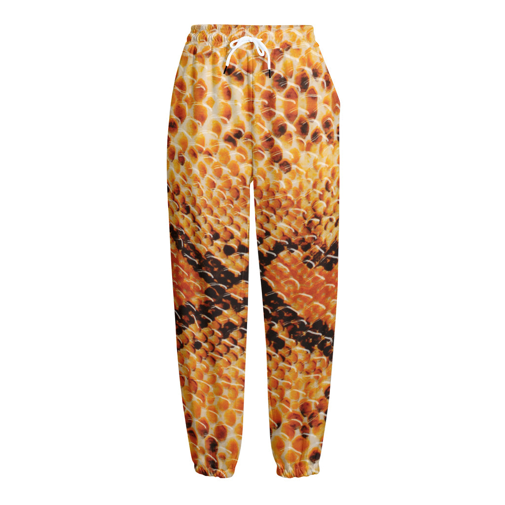 Orange Snakeskin Print Fleece Lined Knit Pants
