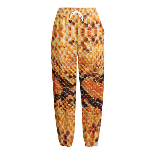 Orange Snakeskin Print Fleece Lined Knit Pants