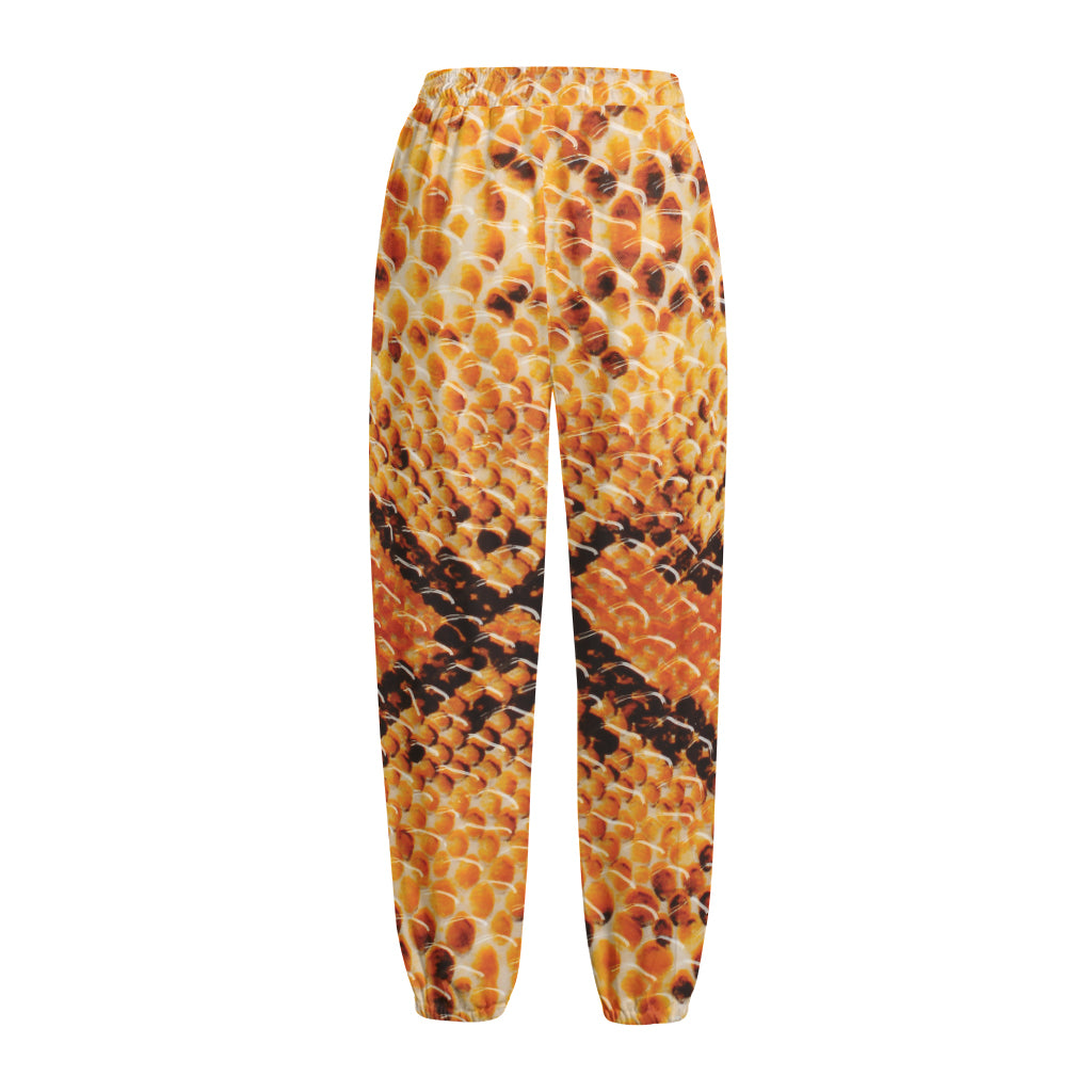 Orange Snakeskin Print Fleece Lined Knit Pants