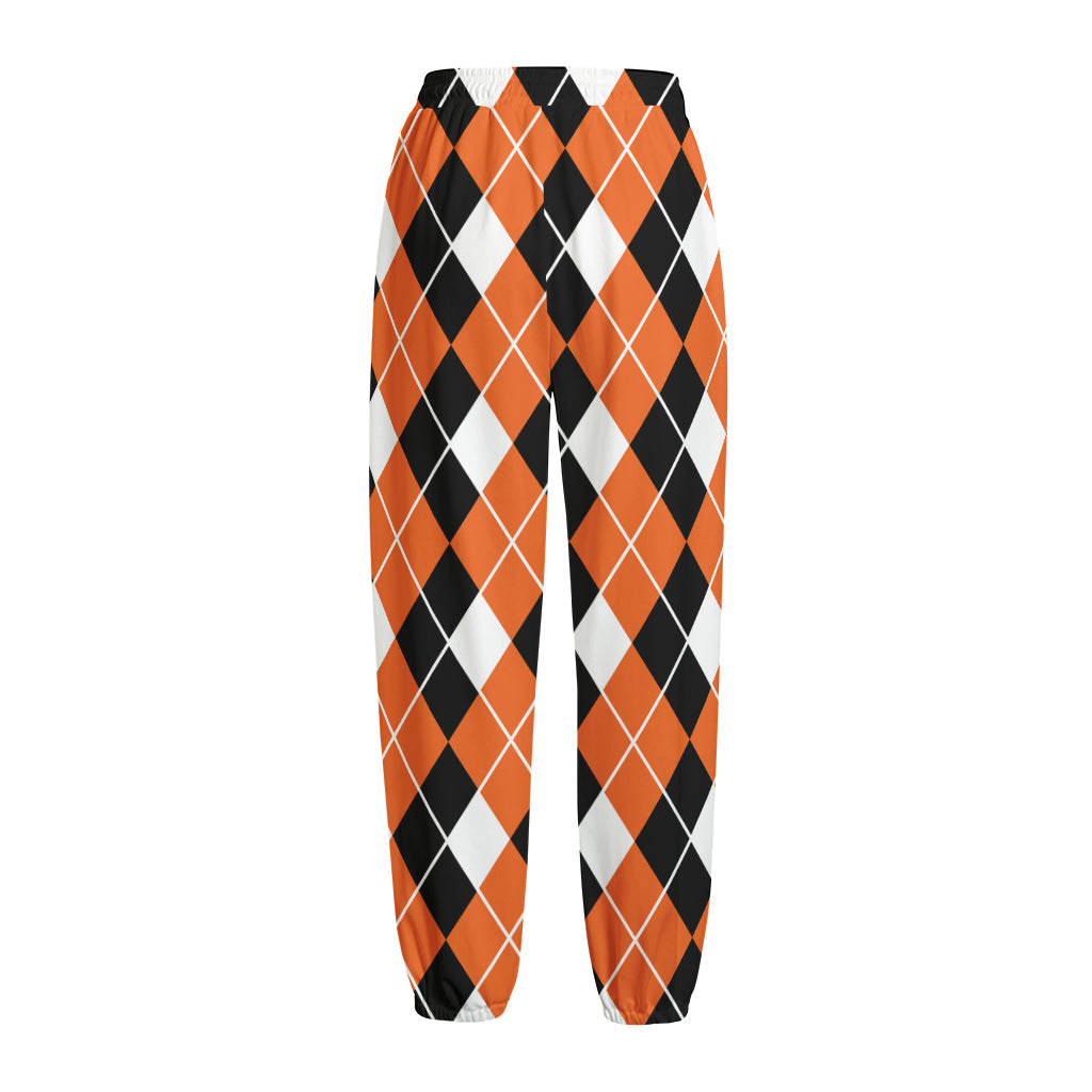 Orange White And Black Argyle Print Fleece Lined Knit Pants