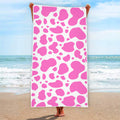 Pink And White Cow Print Beach Towel