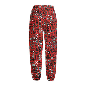 Red Adinkra Tribe Symbols Print Fleece Lined Knit Pants