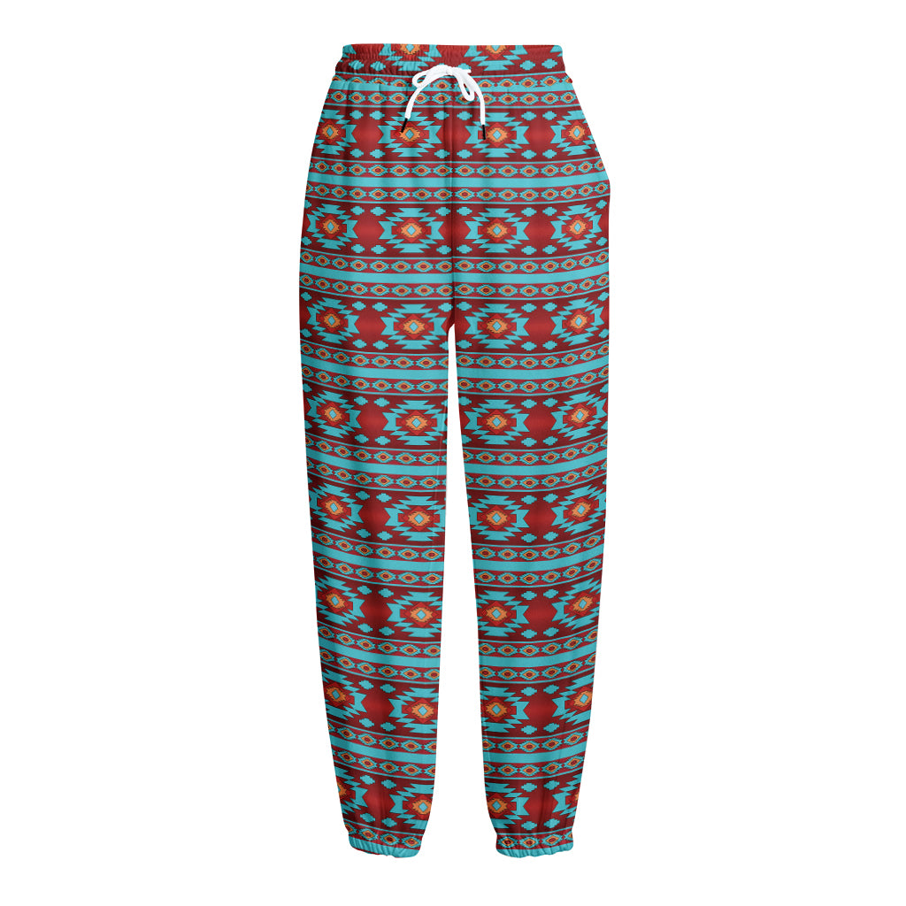 Red And Teal Southwestern Pattern Print Fleece Lined Knit Pants