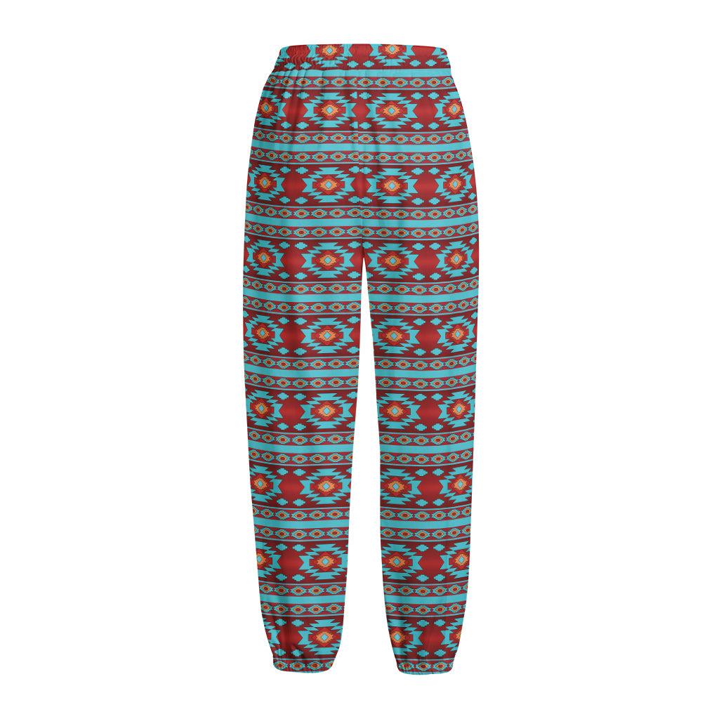 Red And Teal Southwestern Pattern Print Fleece Lined Knit Pants