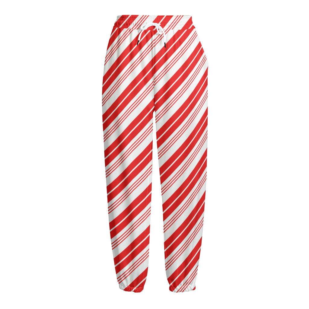 Red And White Candy Cane Stripe Print Fleece Lined Knit Pants