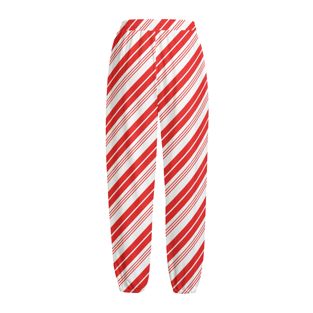 Red And White Candy Cane Stripe Print Fleece Lined Knit Pants