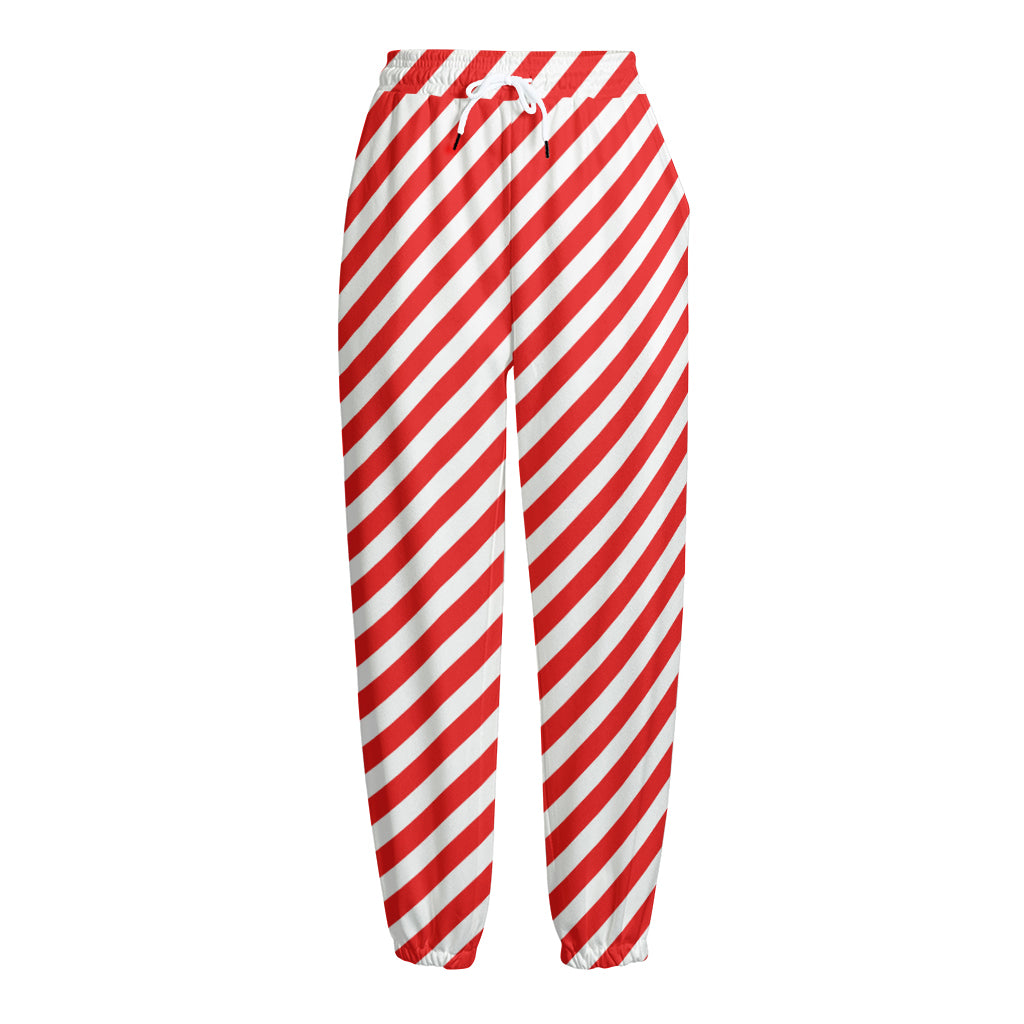 Red And White Candy Cane Striped Print Fleece Lined Knit Pants