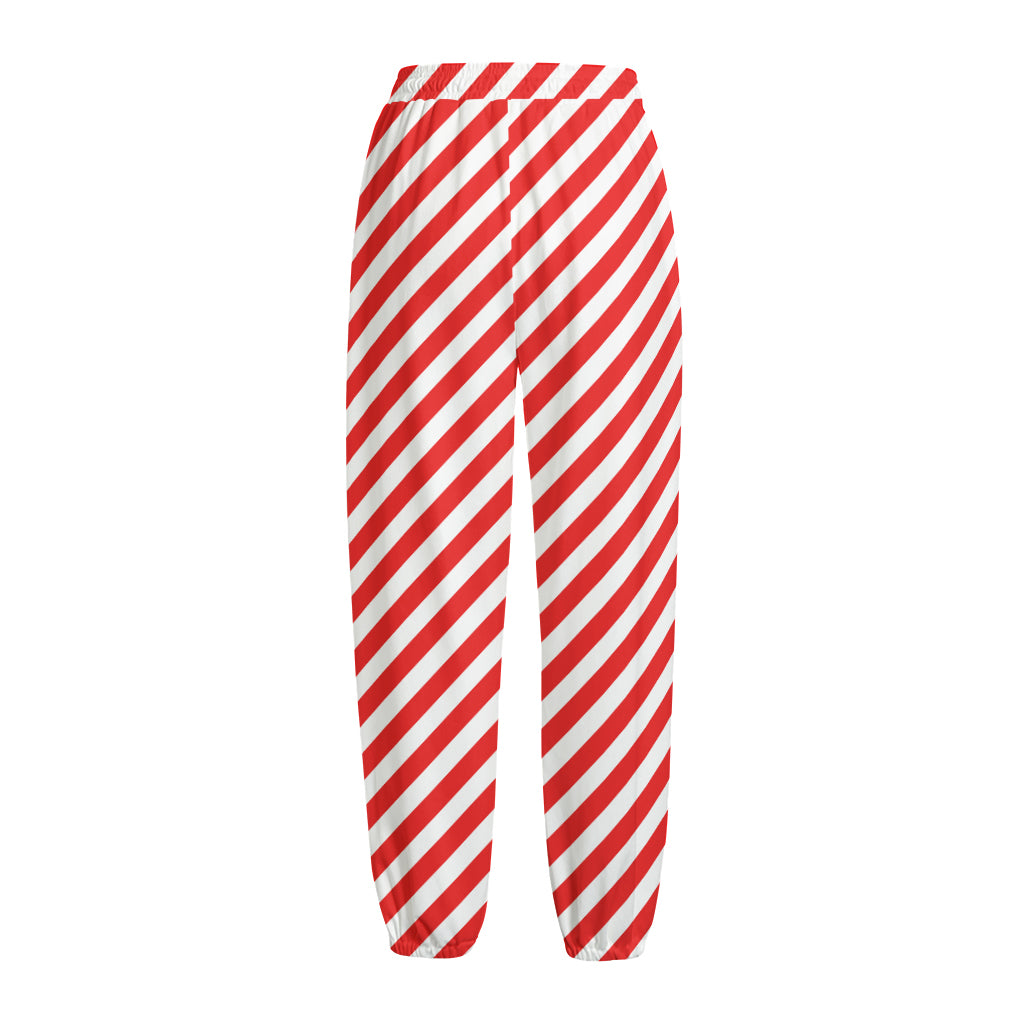 Red And White Candy Cane Striped Print Fleece Lined Knit Pants