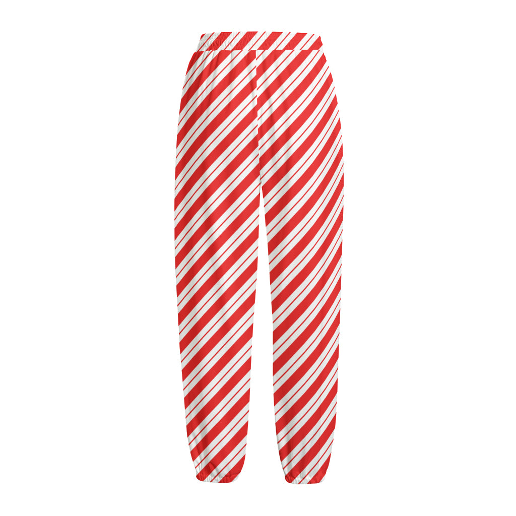 Red And White Candy Cane Stripes Print Fleece Lined Knit Pants