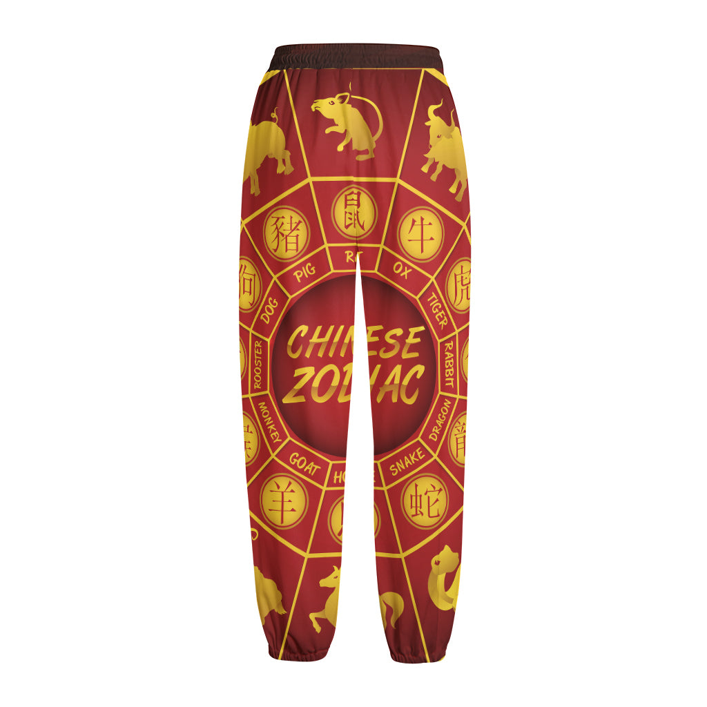 Red And Yellow Chinese Zodiac Print Fleece Lined Knit Pants