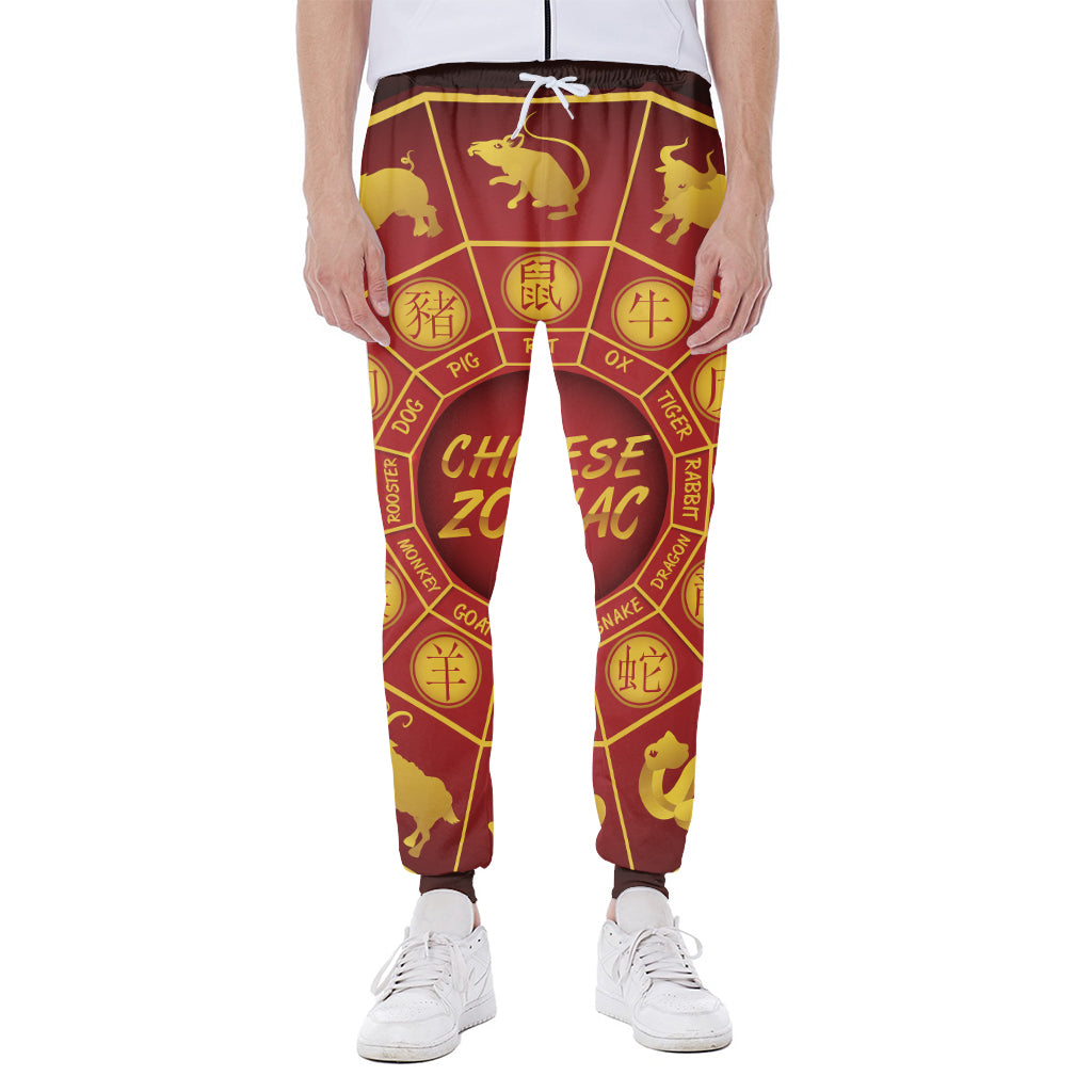 Red And Yellow Chinese Zodiac Print Scuba Joggers