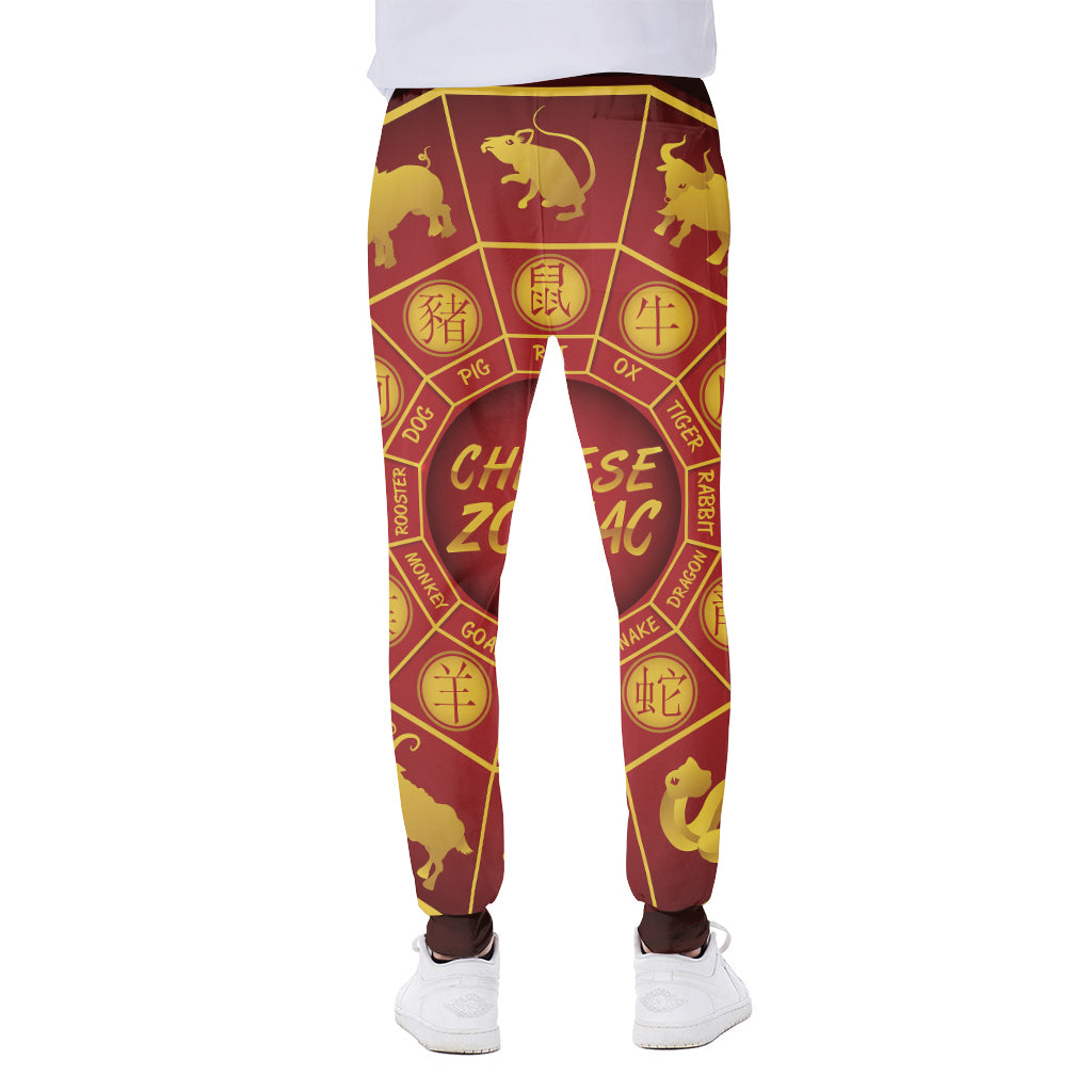 Red And Yellow Chinese Zodiac Print Scuba Joggers