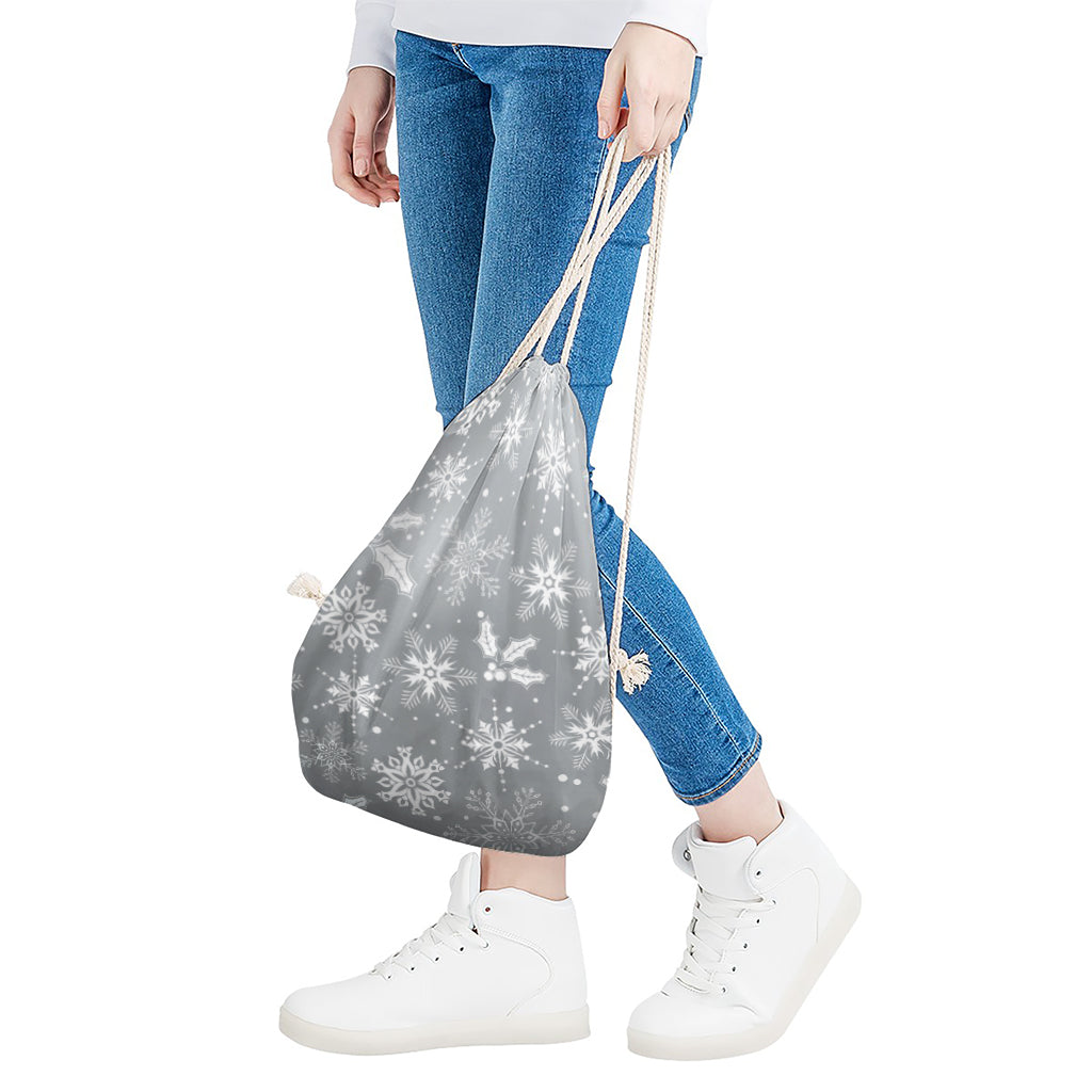 Silver And White Snowflake Pattern Print Drawstring Bag