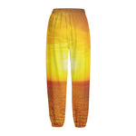 Sunset Over Sea Print Fleece Lined Knit Pants