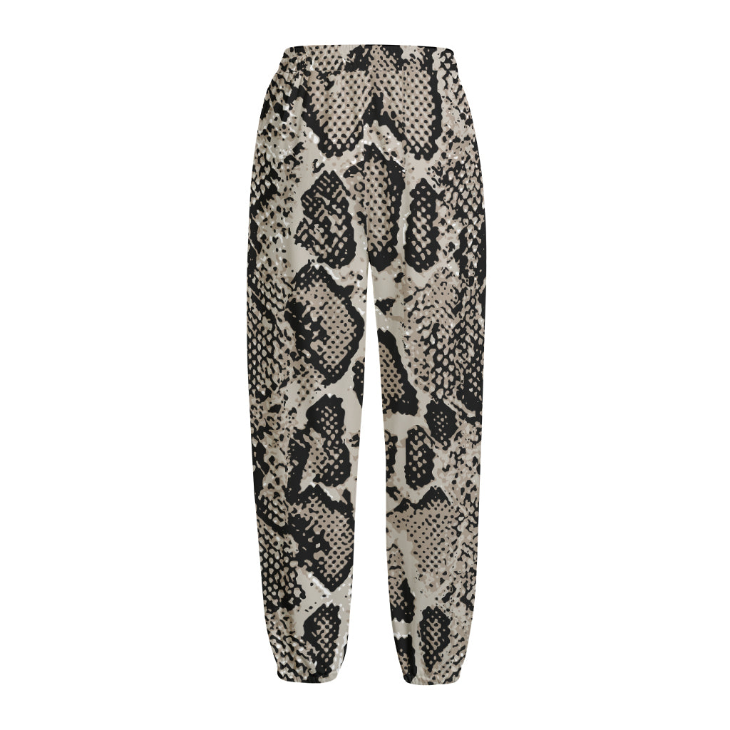 Tan And Black Snakeskin Print Fleece Lined Knit Pants