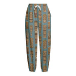 Tiki Totem Pattern Print Fleece Lined Knit Pants