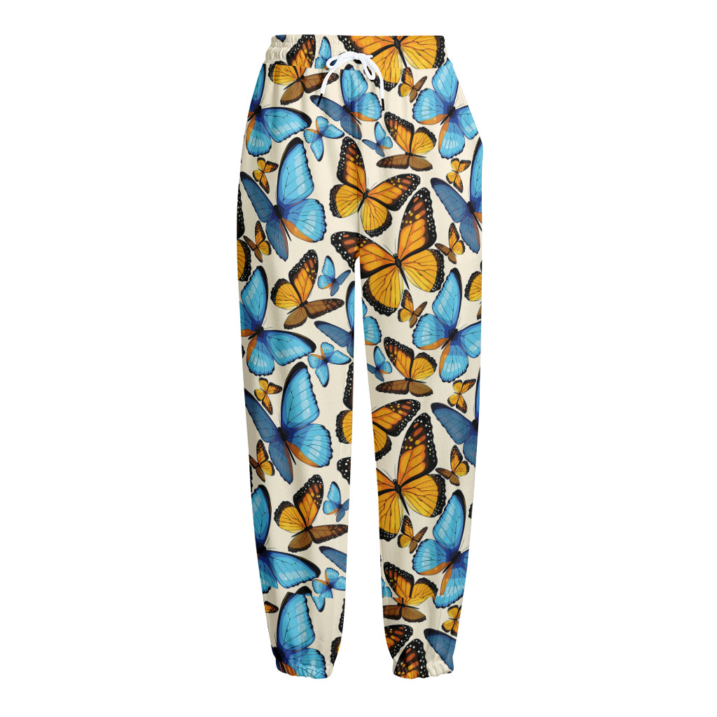 Turquoise And Orange Butterfly Print Fleece Lined Knit Pants