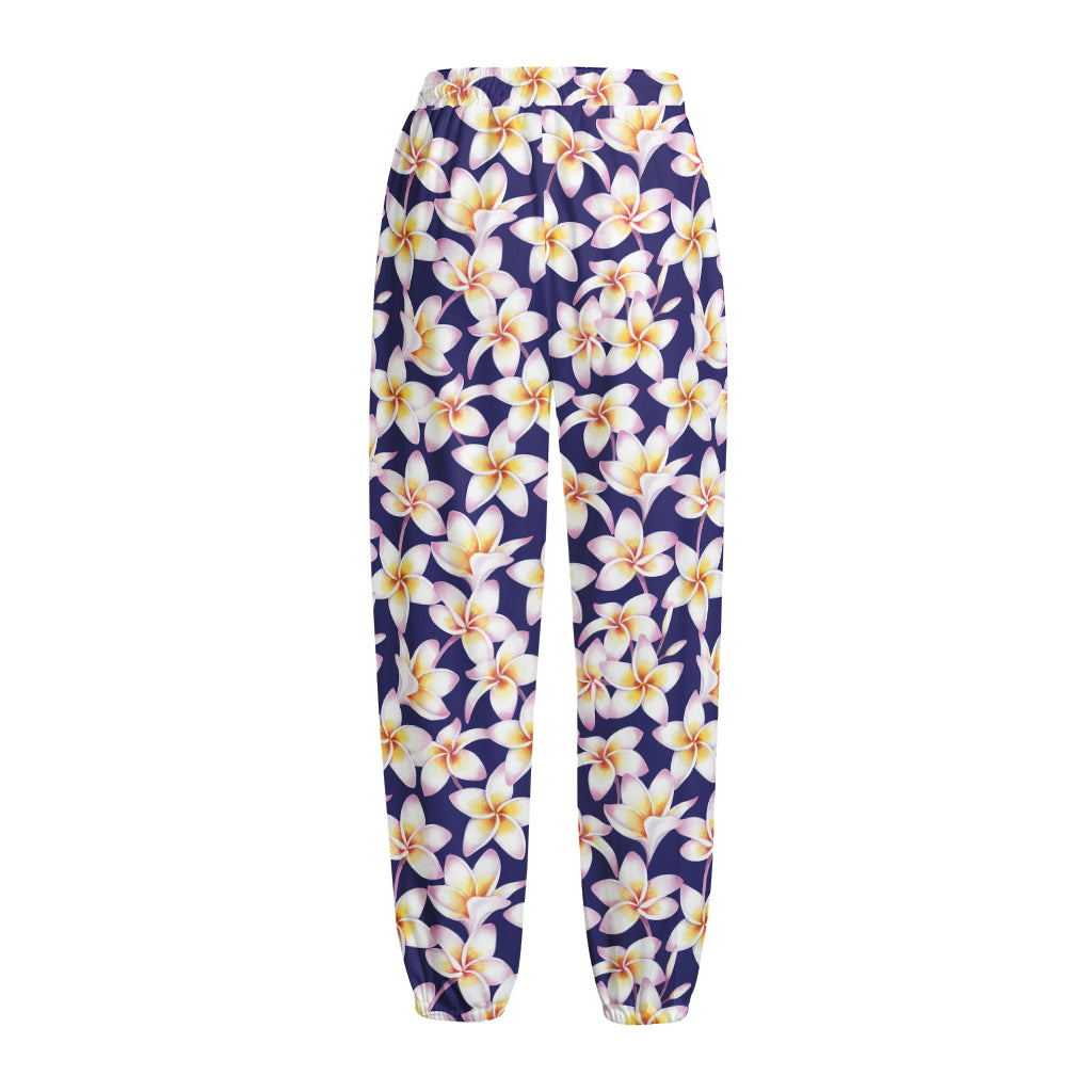 Watercolor Frangipani Flower Print Fleece Lined Knit Pants