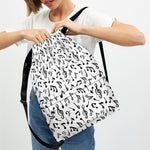 White And Black Music Note Pattern Print Drawstring Backpack